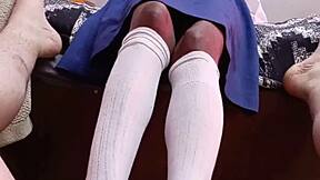 petite student gives teacher a footjob