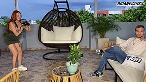 Andrea Castro, horny redhead photographer, seduces Brian Evansx with big tits