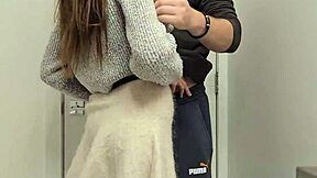 Petite girl in miniskirt moans loud while bent over in bathroom doggystyle.