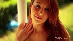 amazing teen is playing with her legs in a solo session