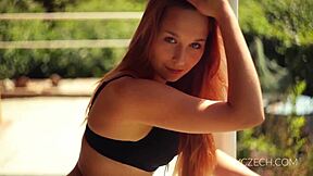 amazing teen is playing with her legs in a solo session