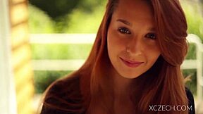 amazing teen is playing with her legs in a solo session