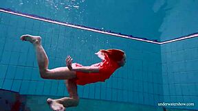 Sexy Naked Avenna Swims Nude in Pool Showing Tight Twat.