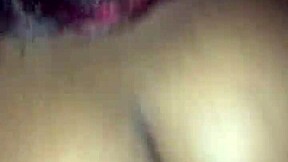 Young woman enjoys hair pulling in intimate scene