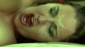 The white whore eagerly explores anal pleasures with a massive black cock in this intense session.