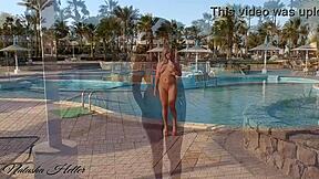 Showing off my body in a tiny pink microbikini outdoors