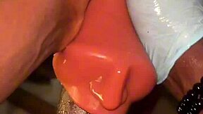 She deepthroats her sextoy like a slave until it gets nasty