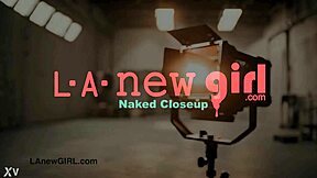 Stunning brunette model shows off her sexy figure on sofa