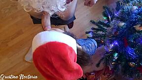 Russian Santa Bangs Girl Under Christmas Tree in Stockings