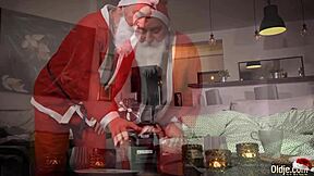 santa visits a pretty redhead for christmas fun