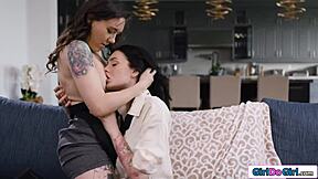 Tattooed waitress strapon banged by dominant lesbian milf in wild session.