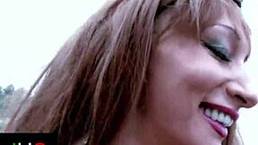 dirty guy bangs a sexy brunette in the ass on the beach