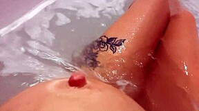 Pretty woman masturbates in hot tub, loud cumshot finale