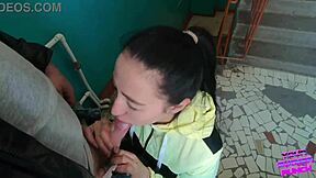 Risky public blowjob on staircase with eager friend