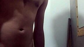 young woman undresses in bathroom for solo session