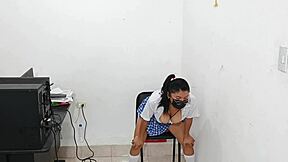 student in uniform gets dominated by the principal with a toy in the office