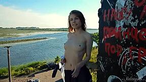 Spunky teen model strips bare in a daring outdoor miniskirt tease. What’s her next move?