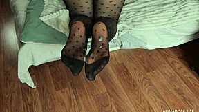 Alina rose gets cum on her feet in black stockings. Her big ass and heels make it so sexy.