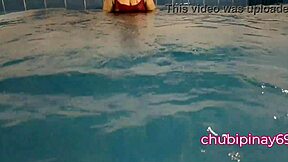 Chubby mommy flashes her natural tits in the public swimming pool, exposing her sexy pussy to onlookers