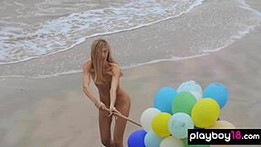 Skinny Italian MILF Plays With Balloons On Beach?