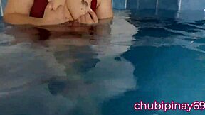 Chubby mommy flashes her natural tits in the public swimming pool, exposing her sexy pussy to onlookers
