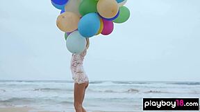 Skinny Italian MILF Plays With Balloons On Beach?