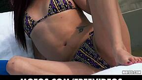 Sunbathing Beauty Feels Exposed As She Slides Bikini Bottoms Aside