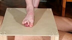 Hungarian domina stomps cock with bare feet in HD.