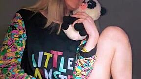 Bonneyuwu in pajamas plays with dildo and plushie on bed