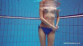 Martina shows off her blue bikini underwater