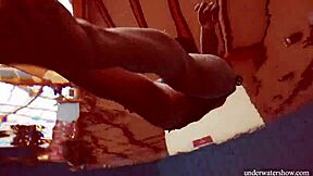 Martina shows off her blue bikini underwater