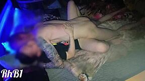 We had sex on a squeaky illuminated hotel bed, moaning with pleasure.