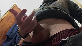 While the rain pours outside, I happily masturbate in the bathroom with my big cock