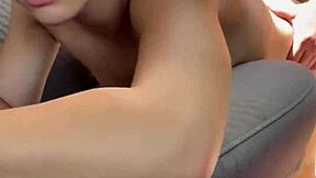 Pretty young woman talks on phone in public