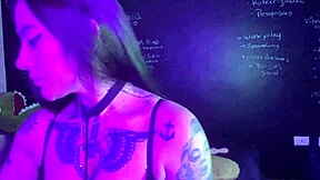 Watch Lexi smoke and masturbate her huge tattooed pussy with toys!