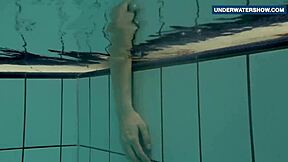 Bright tits flashing underwater turns everyone on