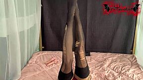 Beautiful slut plays with two toys deepthroating.