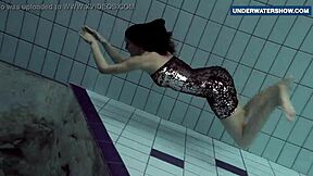 Bright tits flashing underwater turns everyone on