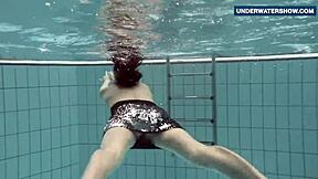 Bright tits flashing underwater turns everyone on