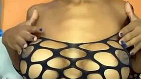 Rich dark-skinned woman with creamy pussy and sweet tits