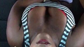 In this homemade scene, a young ebony girl with big tits does a striptease before some hardcore car sex