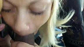Sucking big black cock in car while talking to neighbor