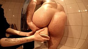 I fist my tattooed friend in the shower with wild intensity. It’s pure chaos!