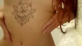 Redhead Teen Enjoys Bathing In The Shower!