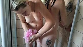 Wanna watch pale blonde and brunette soap up close in the shower with a loofah?