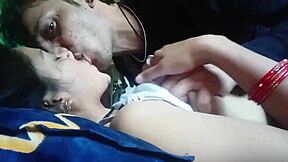 kissing girlfriend's big tits