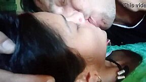 kissing girlfriend's big tits