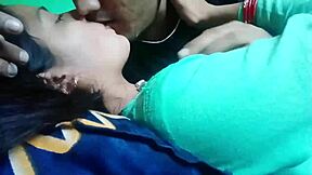 kissing girlfriend's big tits