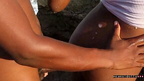 Beach vacation blowbang with black lover sucking tits