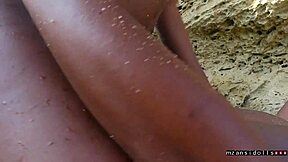 Beach vacation blowbang with black lover sucking tits